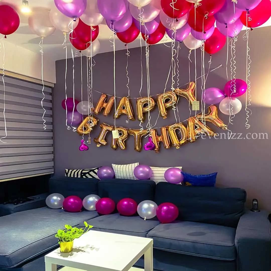 Simple birthday decoration with balloons and backdrop for home celebration