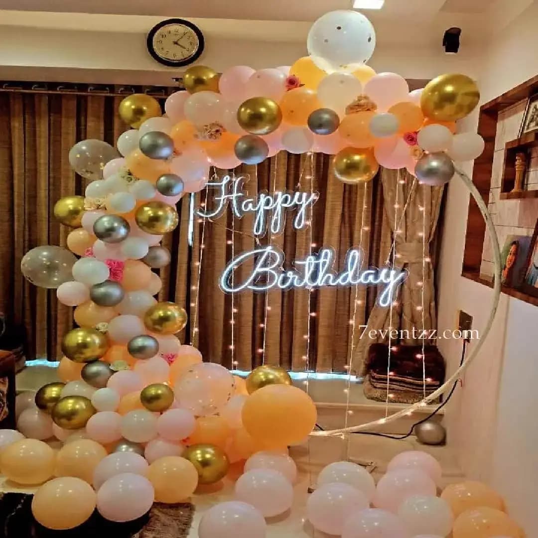 Happy Birthday neon light decoration with glowing sign and balloon setup