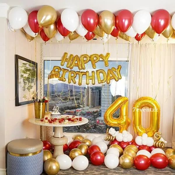 Surprise birthday hall decoration with balloons and festive backdrop