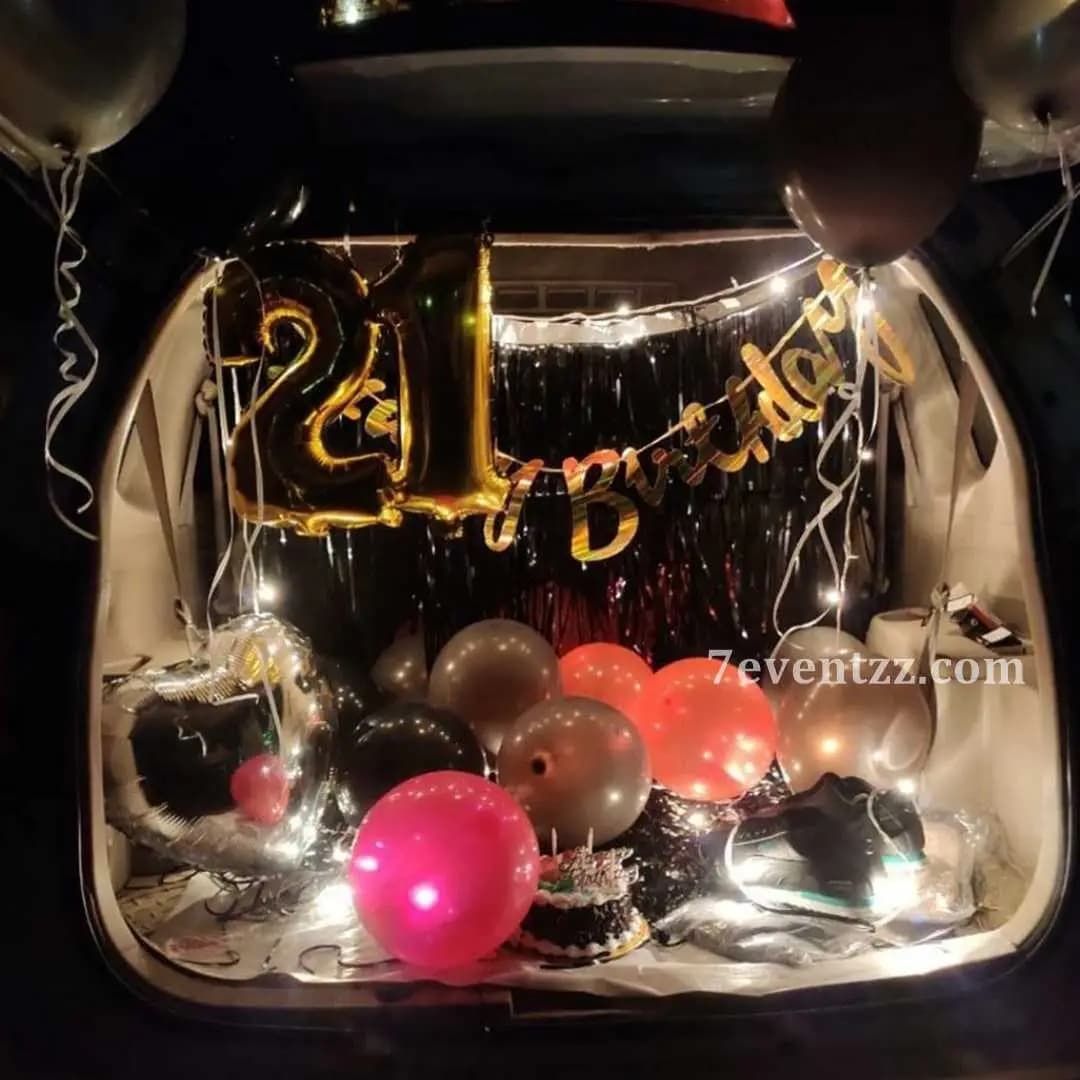 Interior car birthday decoration with balloons and festive elements