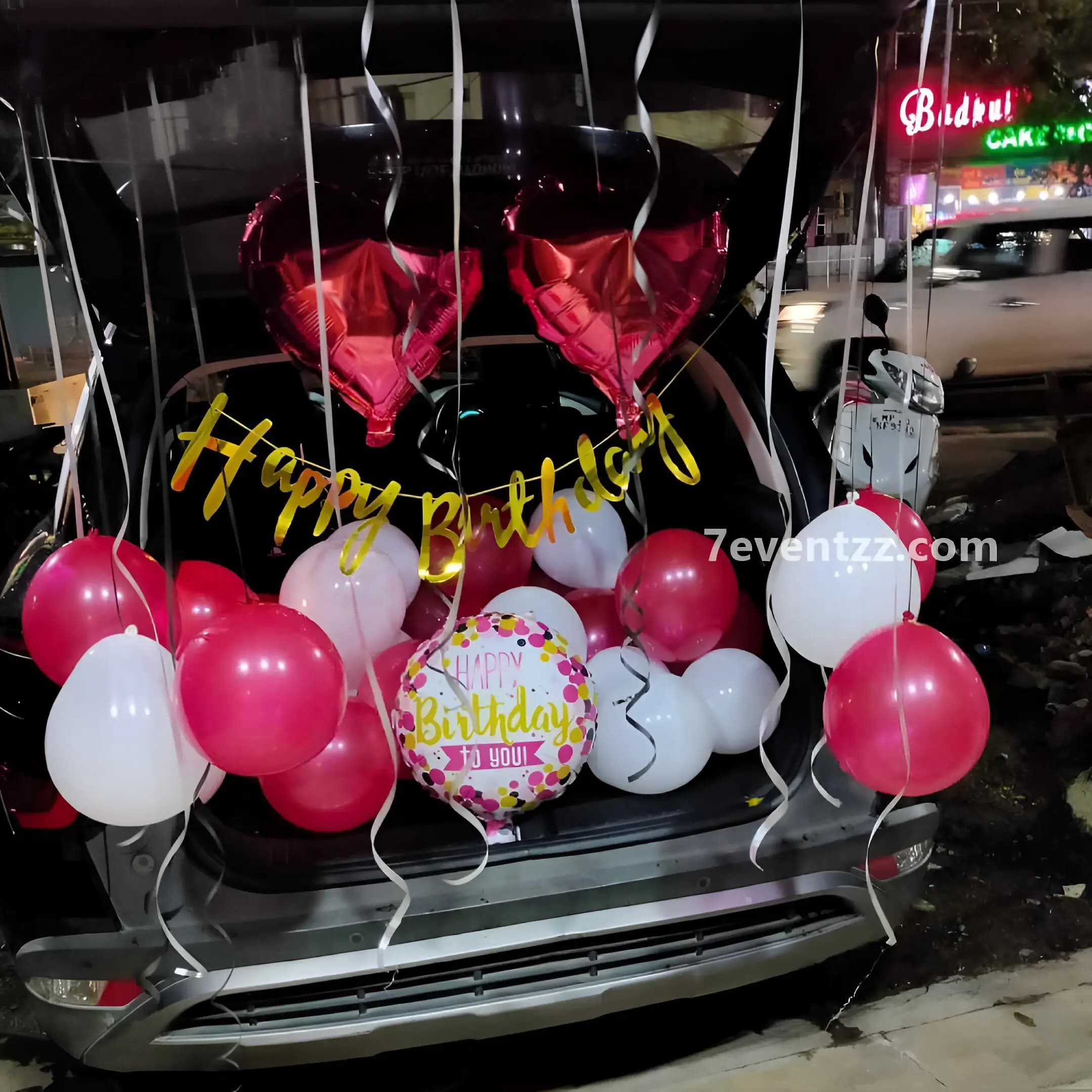Car boot decoration with ribbon and balloon arrangement
