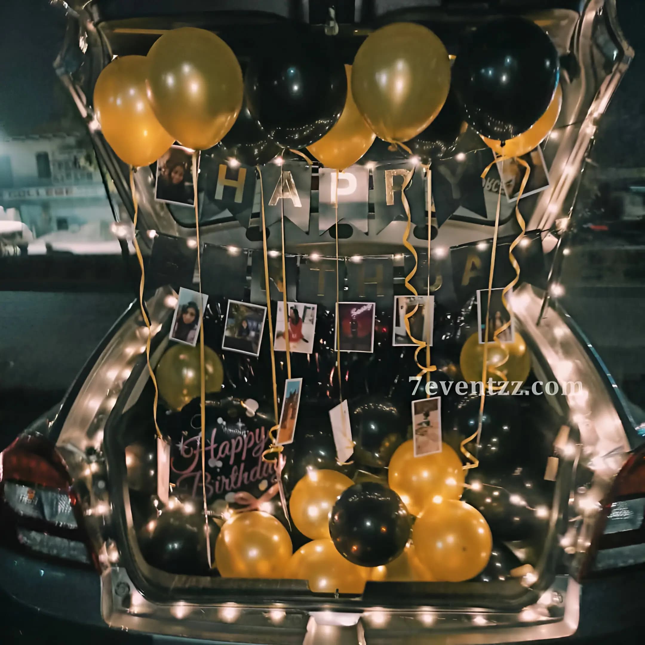 Car boot decoration featuring personalized photo prints and balloons