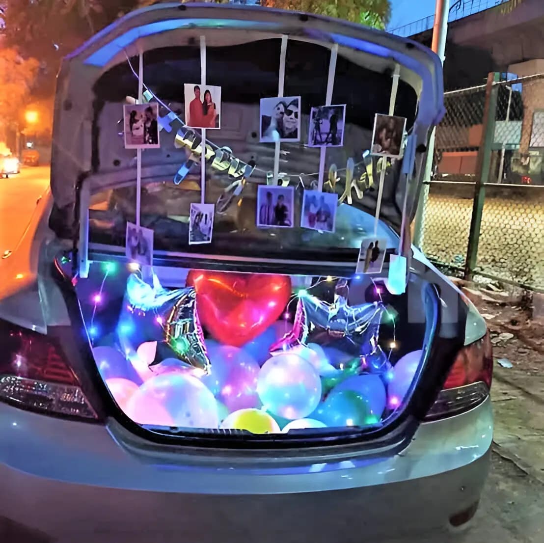 Car dikki decoration with personalized photo display and balloons