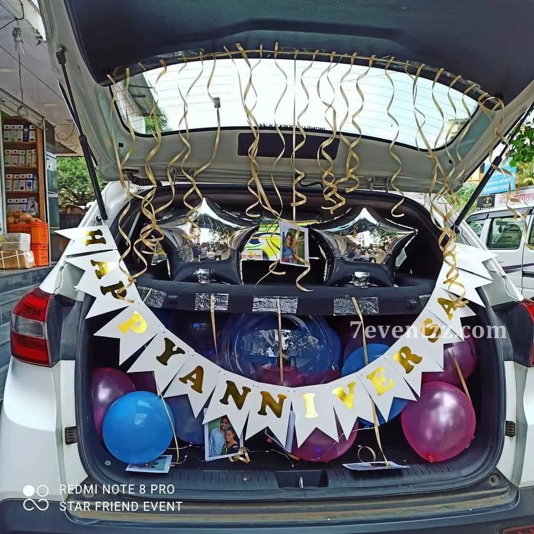 Surprise car boot decoration with balloons and festive elements