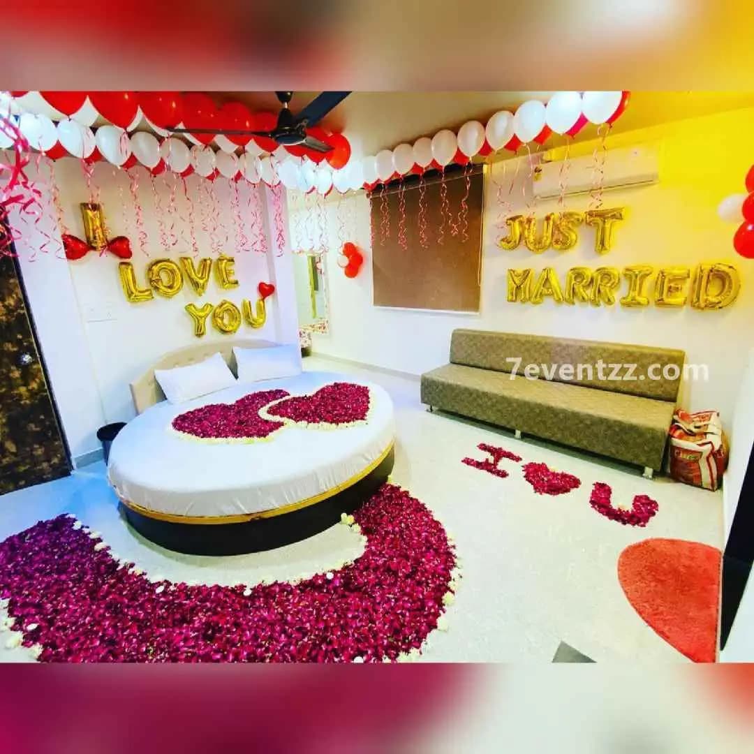 Flower bed decoration with rose petals and floral clusters