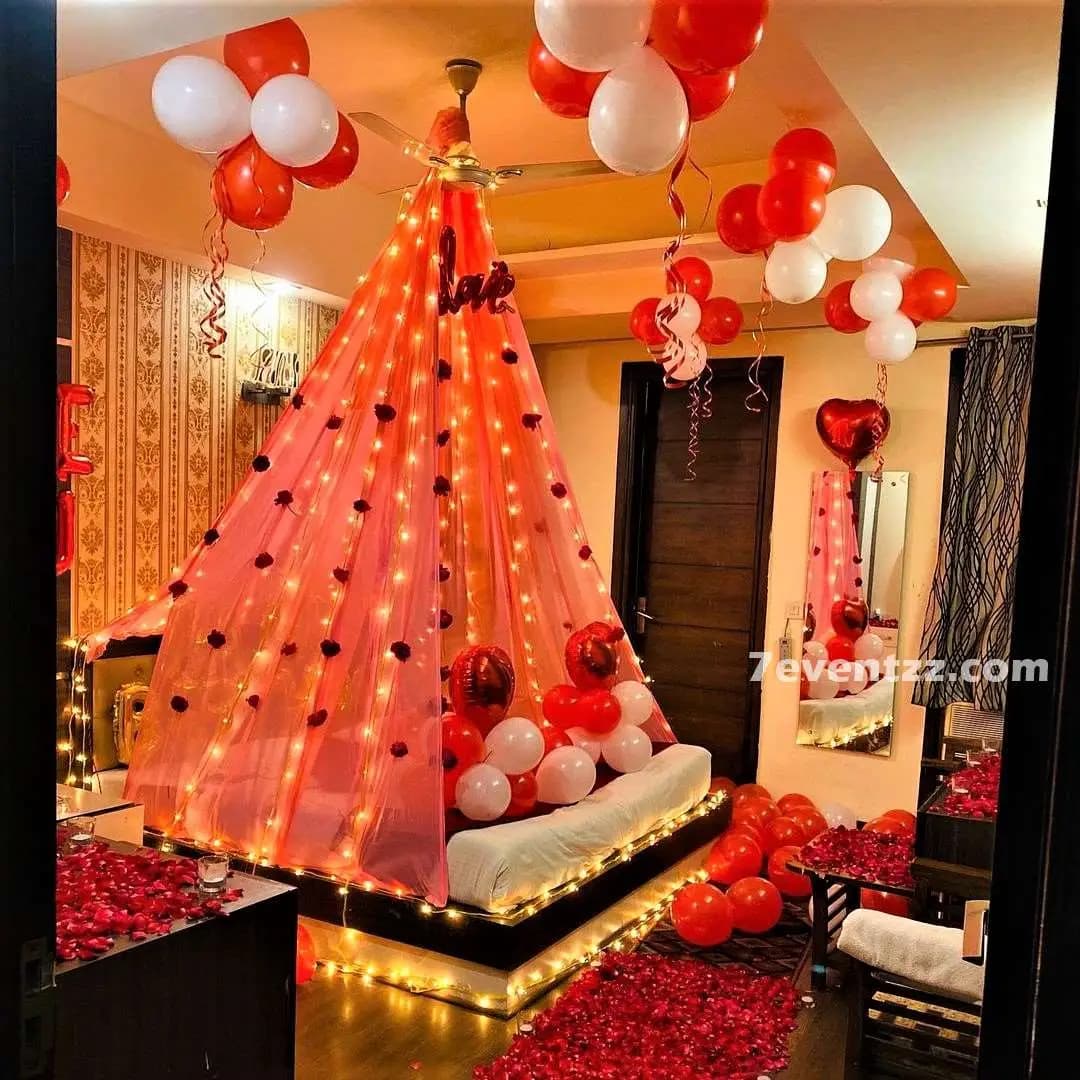 First night canopy bed decoration with drapes and flowers