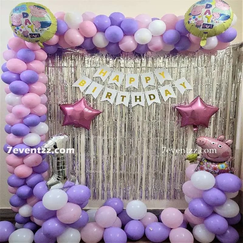Peppa Pig theme birthday decoration with vibrant balloon arrangement and Peppa character props for kids – 7eventzz