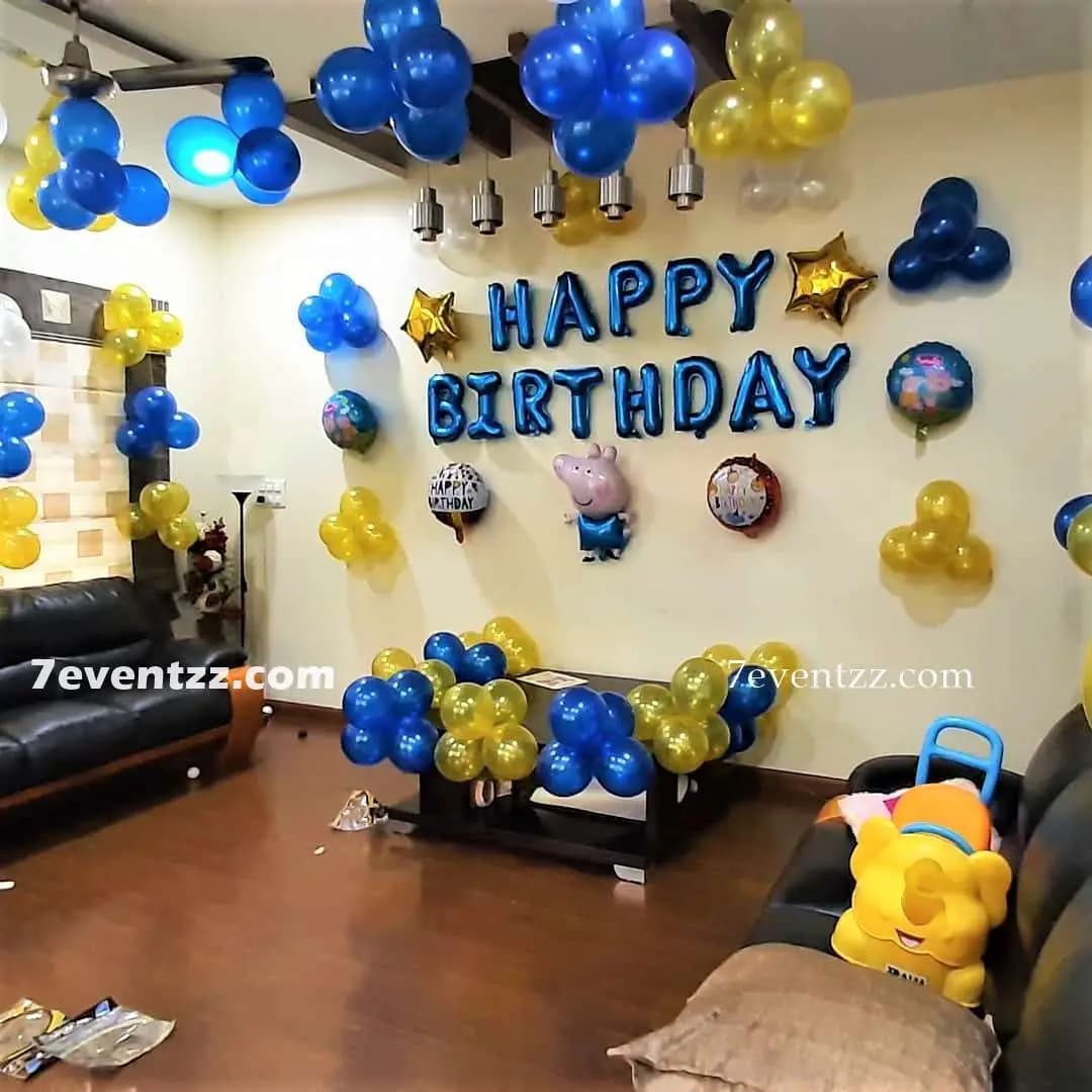 Peppa Pig hall decoration setup with colorful balloons and character cutouts for kids birthday party – 7eventzz