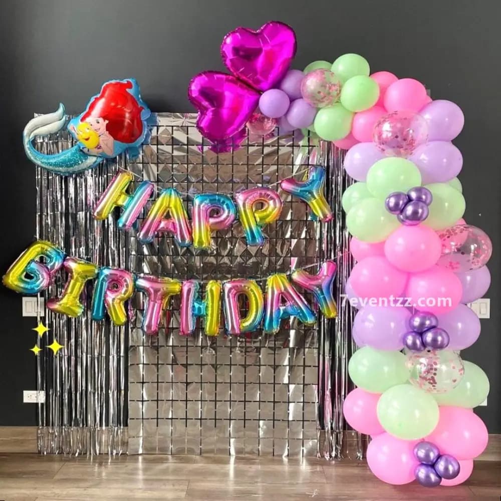 Colorful mermaid theme birthday decoration with pastel balloons and vibrant underwater party setup for kids by 7eventzz