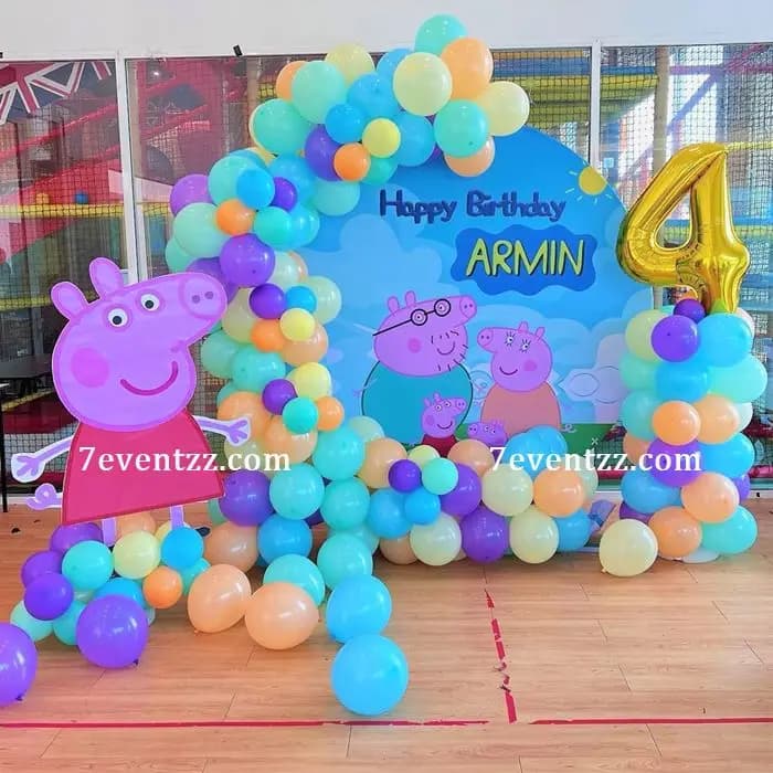 Peppa Pig family themed kids birthday decoration with character cutouts, balloon arrangements, and themed backdrop – 7eventzz