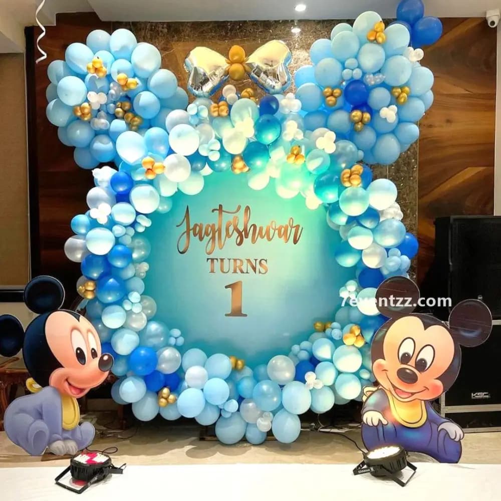 Mickey Mouse Disneyland themed birthday decoration with classic red, yellow, and black balloon setup