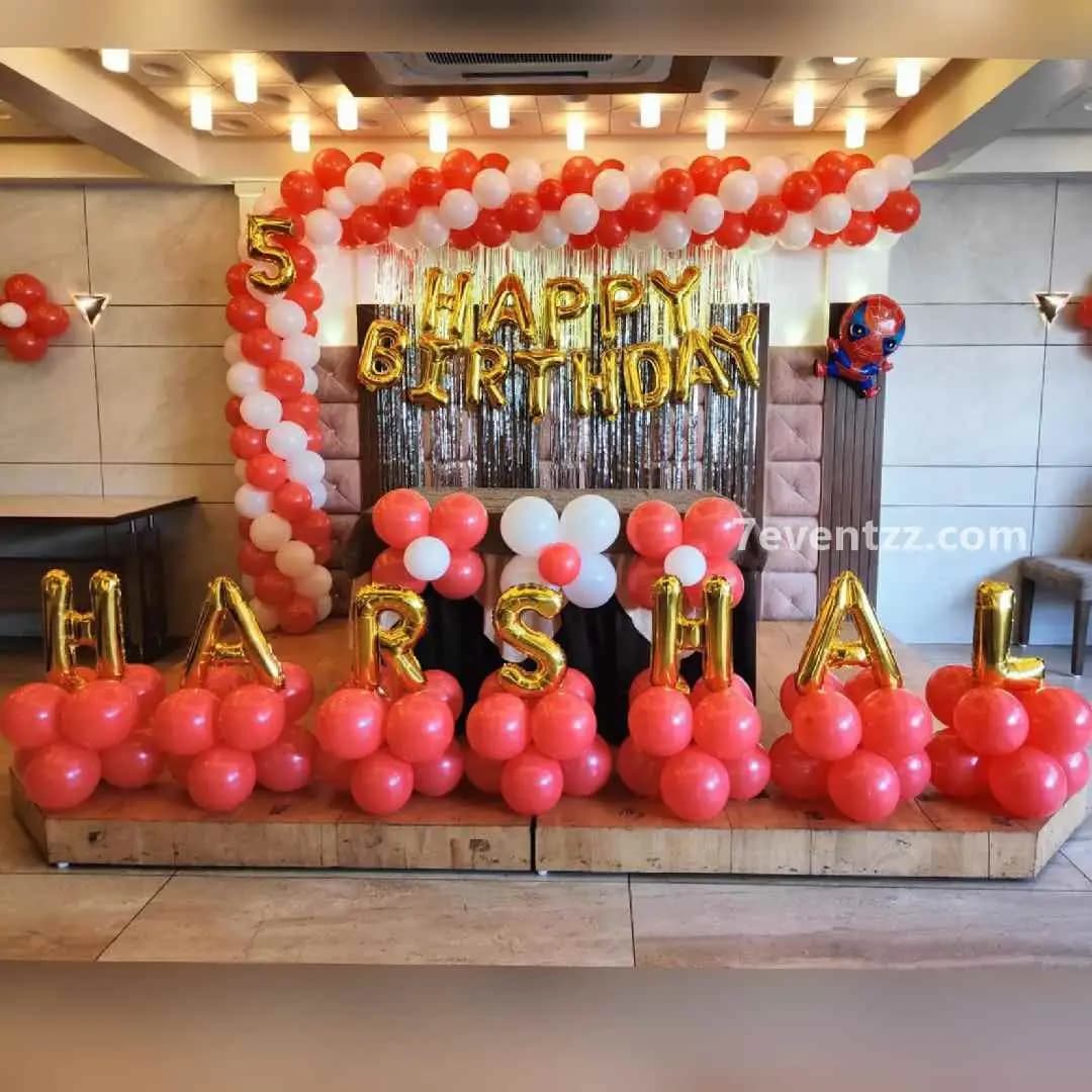 Simple Spiderman stage decoration with balloon columns and themed backdrop for kids birthday by 7eventzz