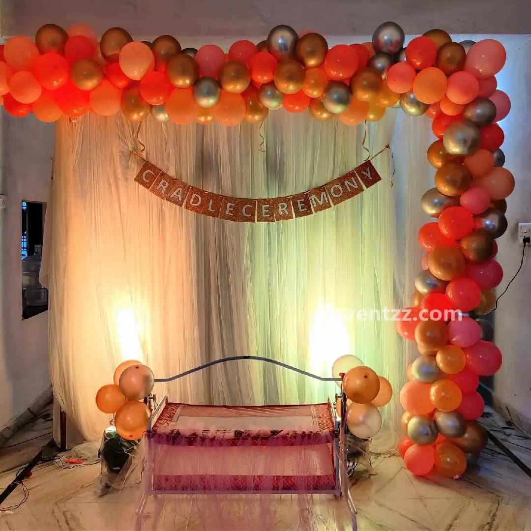 Simple and beautiful cradle ceremony decoration with balloons and fabric