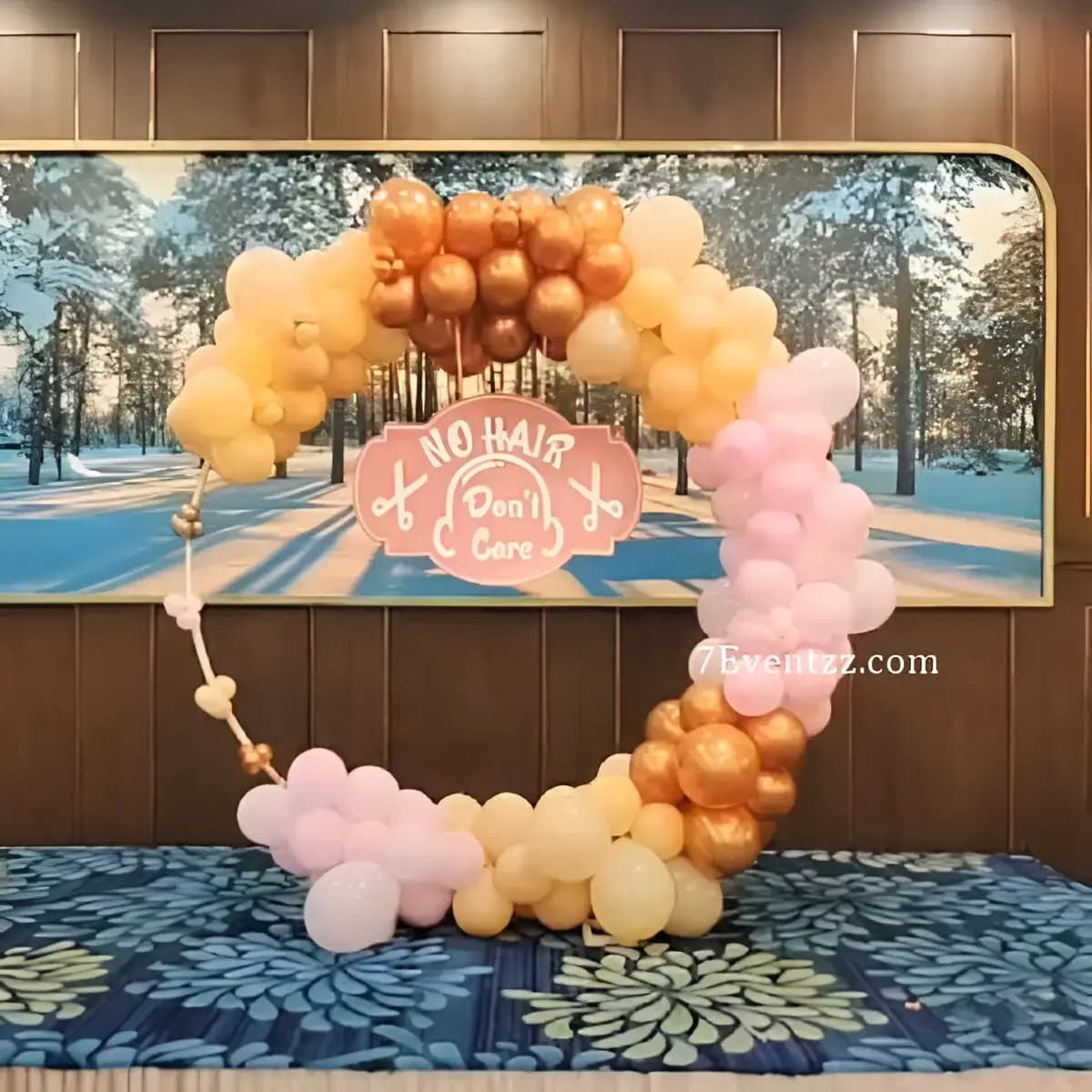 Ring-style stage setup for mundan ceremony with balloon and fabric decor