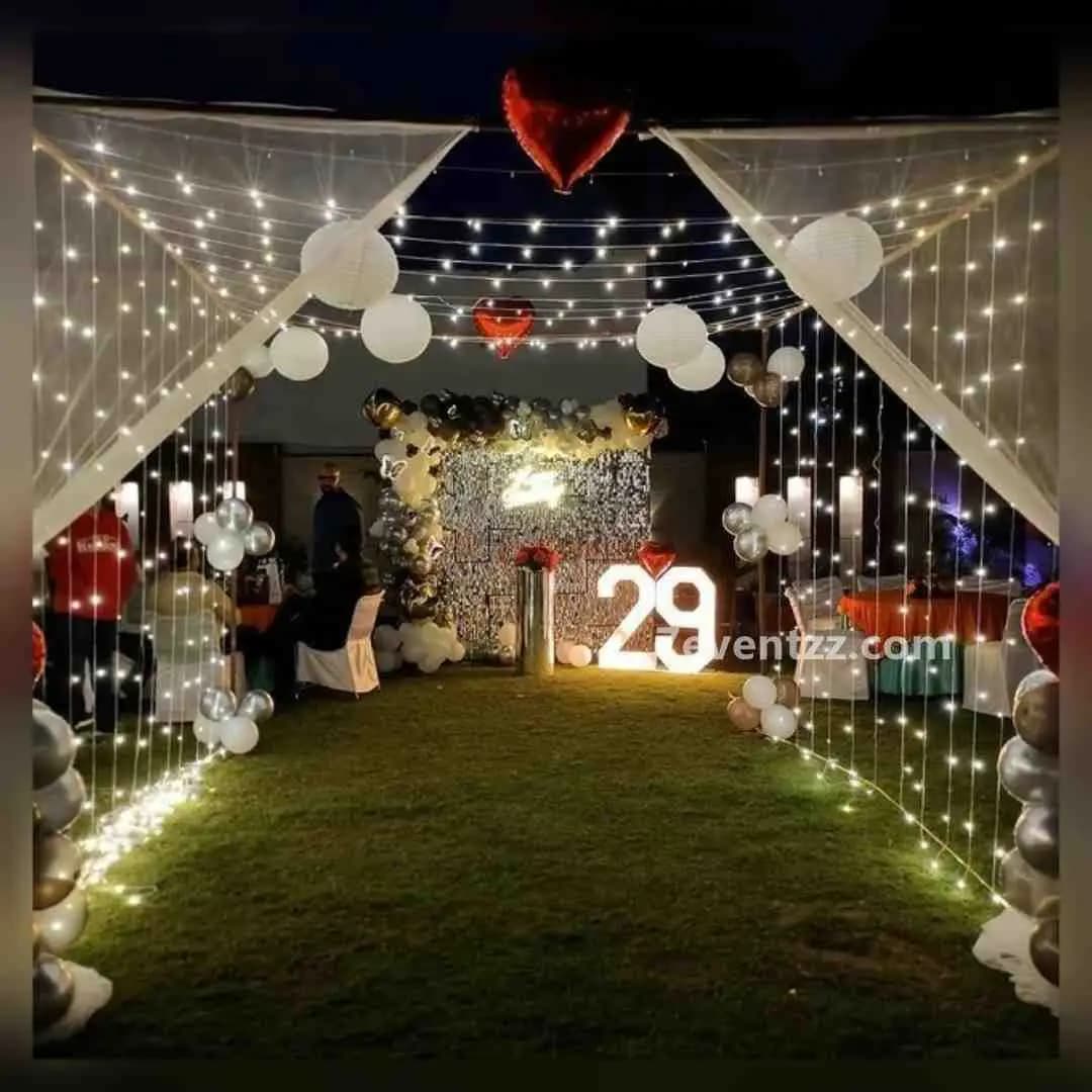 Birthday sequin backdrop terrace decoration with shimmering curtain, balloons, and festive lighting for outdoor party – 7eventzz