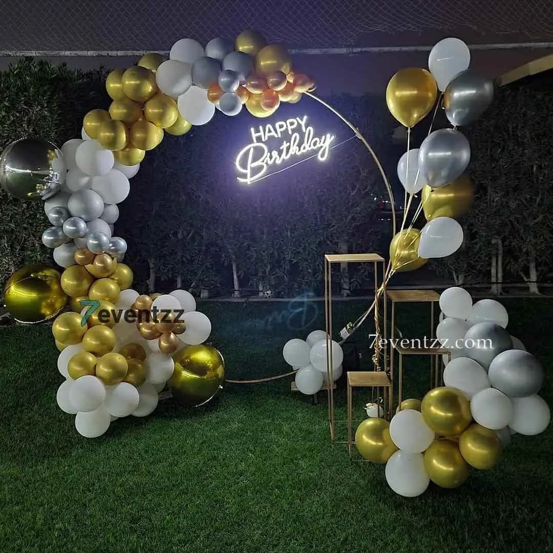 Terrace neon decoration with glowing neon lights and balloon arrangement for outdoor night birthday party – 7eventzz