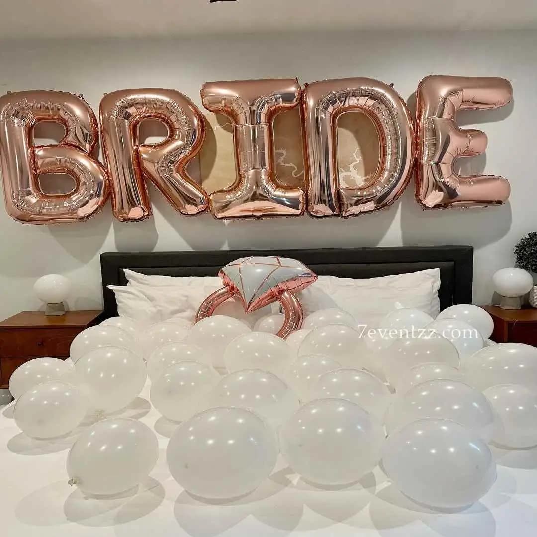 Bachelorette room setup with bride-to-be balloons and decor