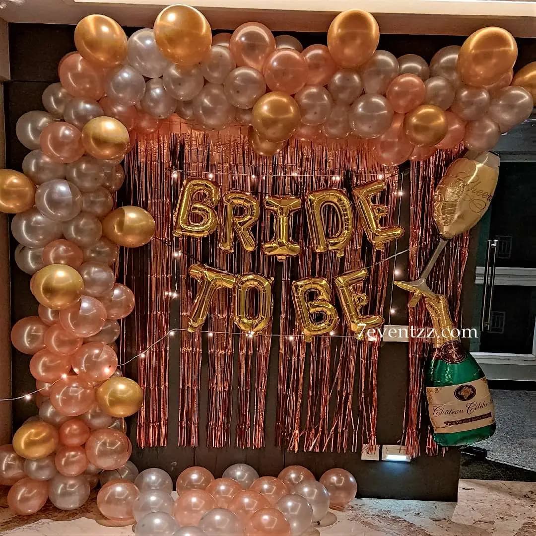 Bride-to-be party decoration with balloons and signage