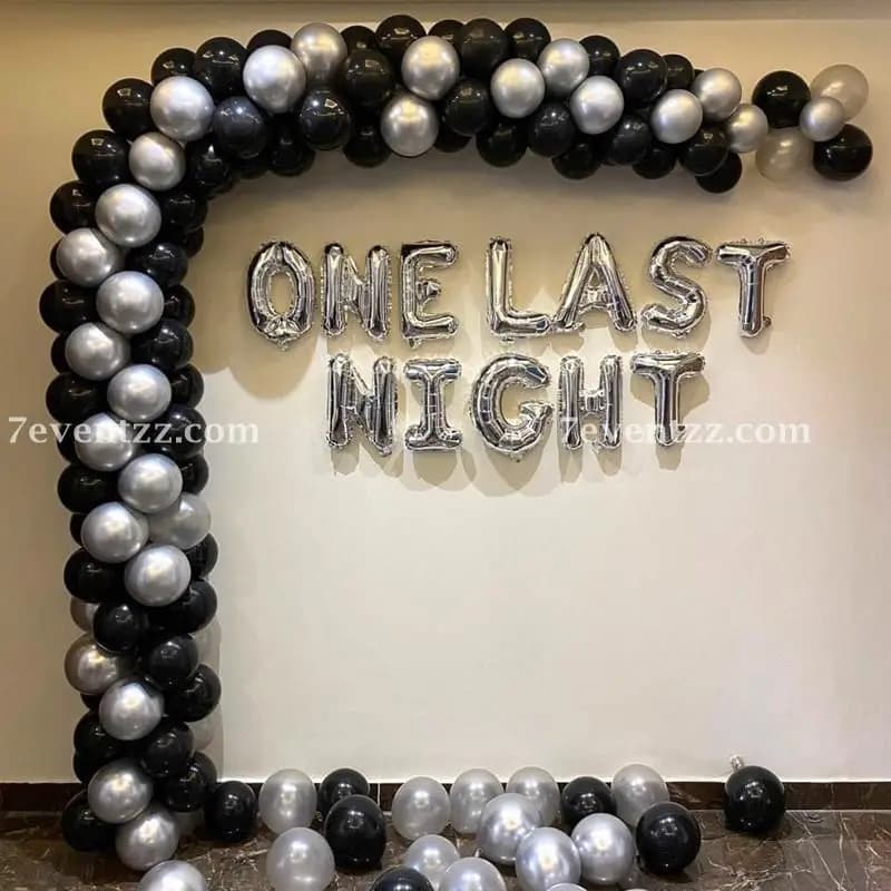 Silver metallic bachelorette party decoration with sequin backdrop