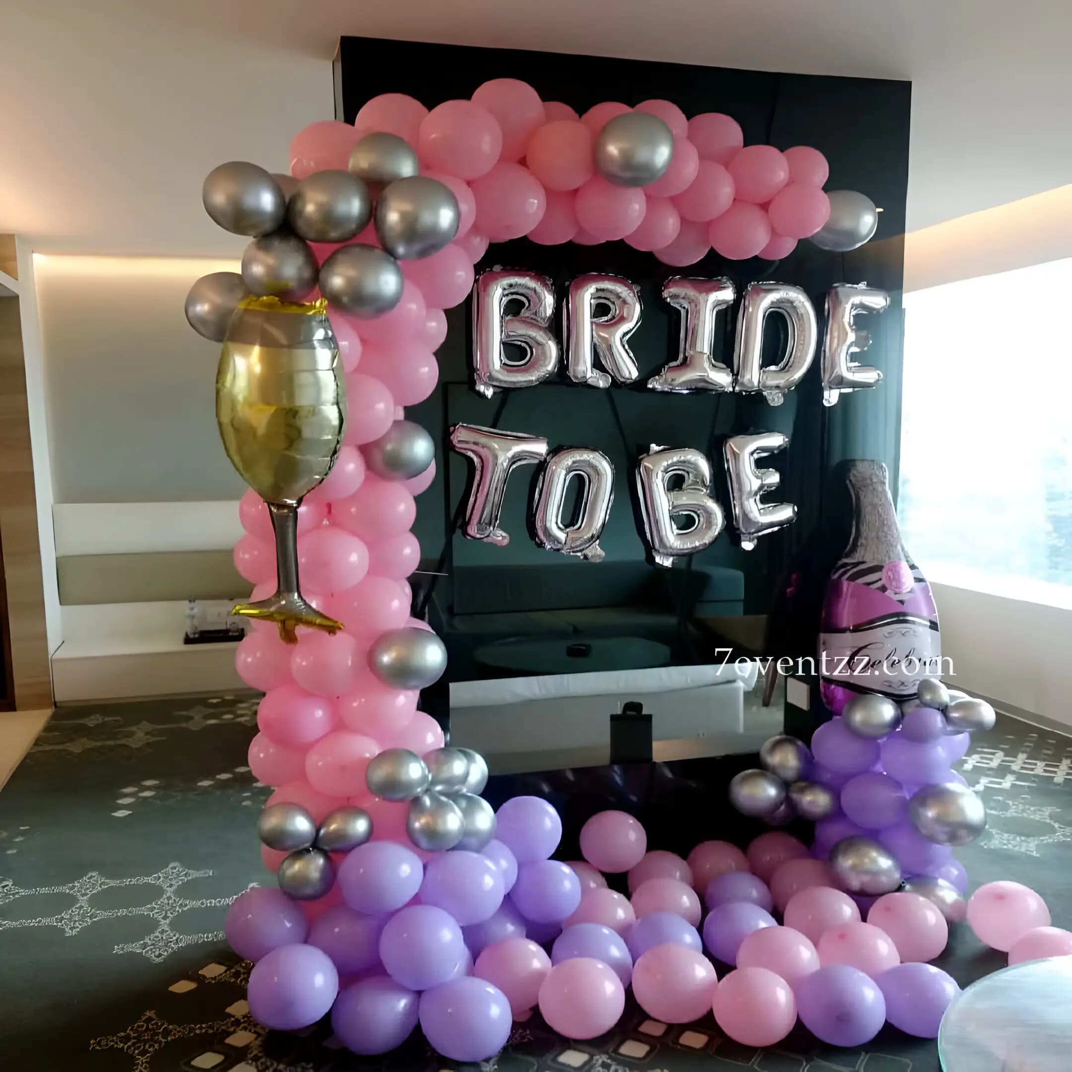 Pastel bride-to-be decoration with soft pink and cream balloons