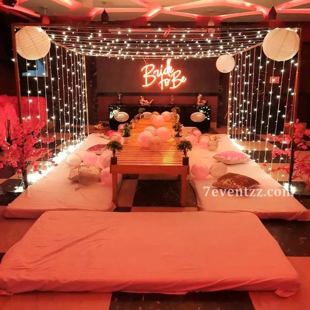 Grand bride-to-be full room decoration with garlands and sequin backdrop