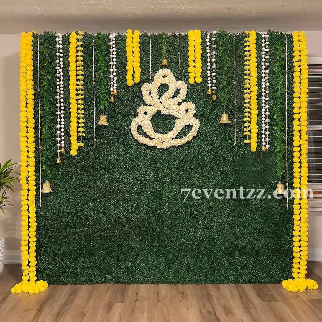 Green Backdrop Haldi Setup — 7eventzz decoration
