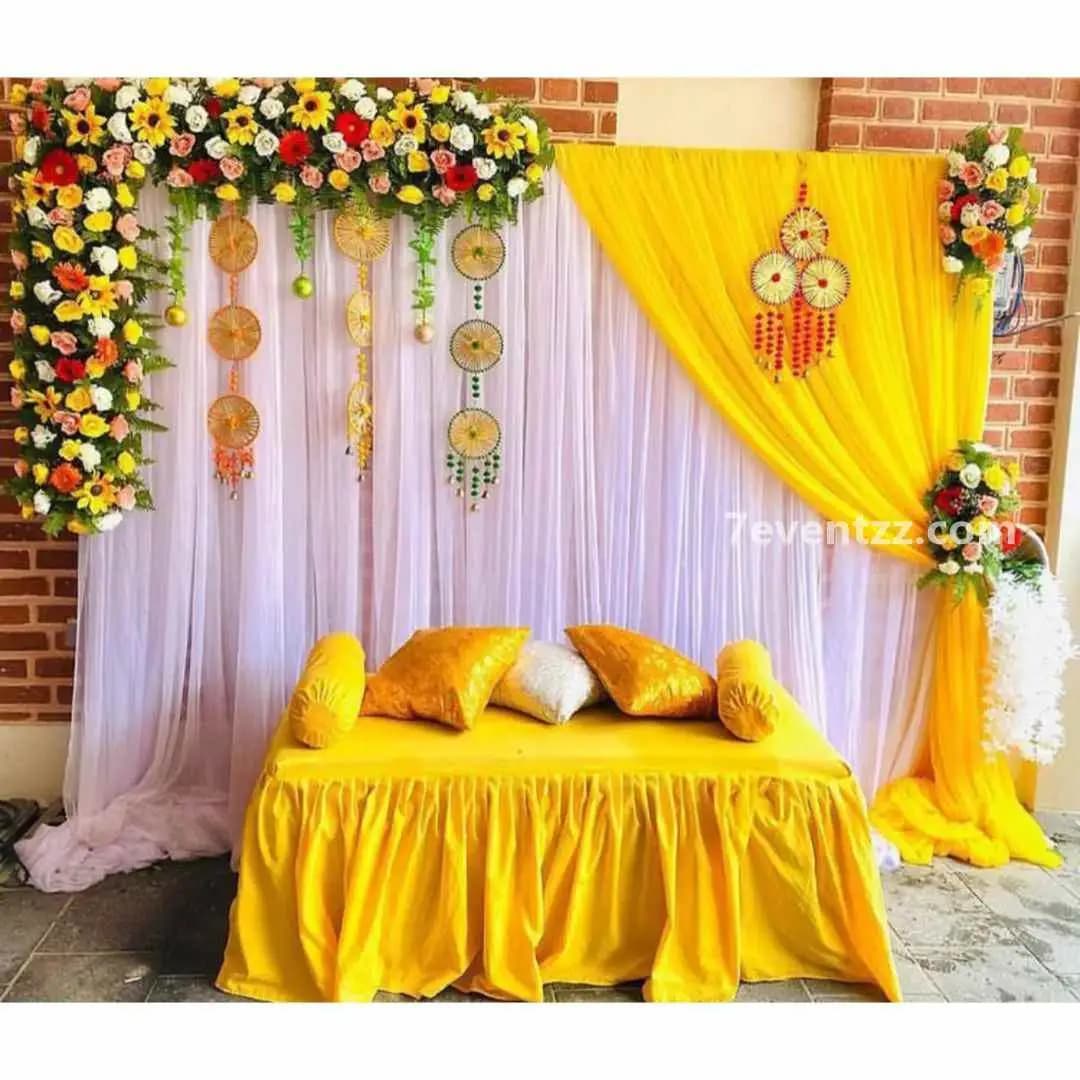Mixed flower backdrop decoration for haldi ceremony