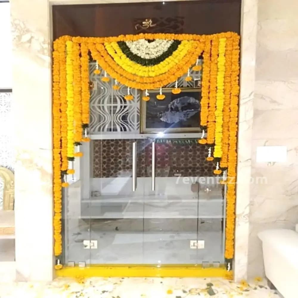 Decorative mandir setup adorned with fresh flowers