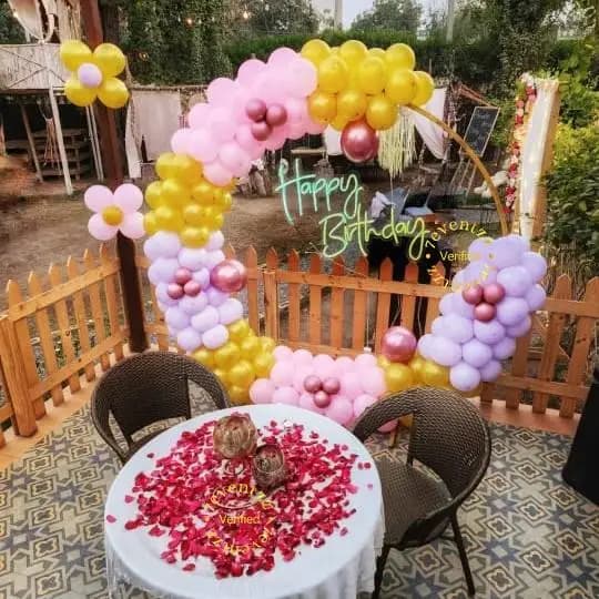 Private outdoor dinner setup with candles and ambient lighting