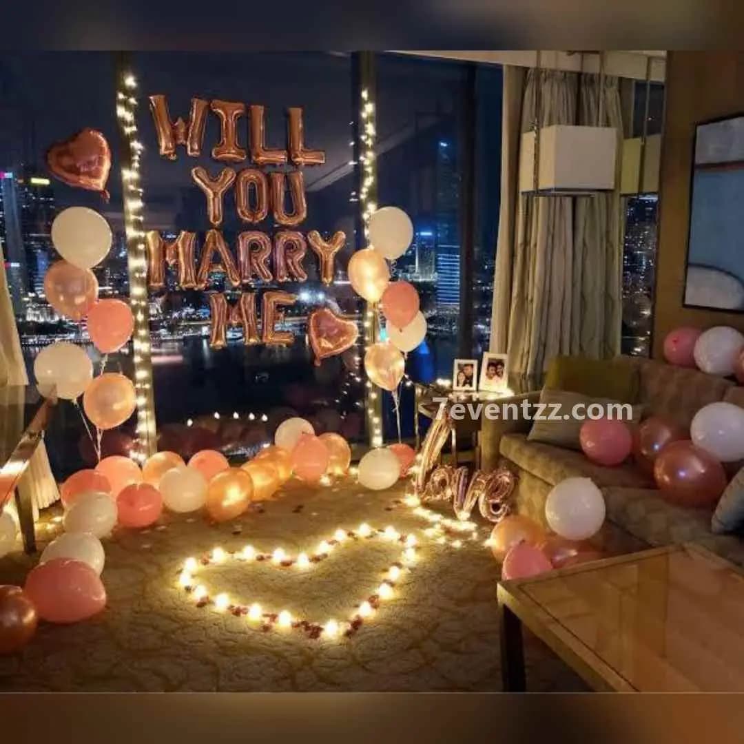 Surprise proposal decoration with balloons, lights, and personalized message