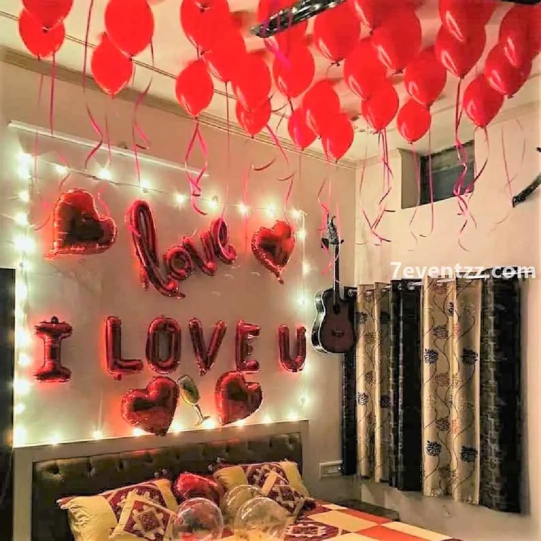 Romantic room proposal setup with candles, petals, and soft ambient lightingl