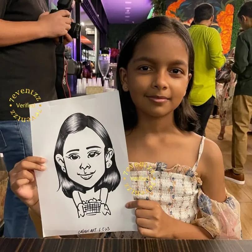 Caricature artist drawing a portrait at a kids' birthday party