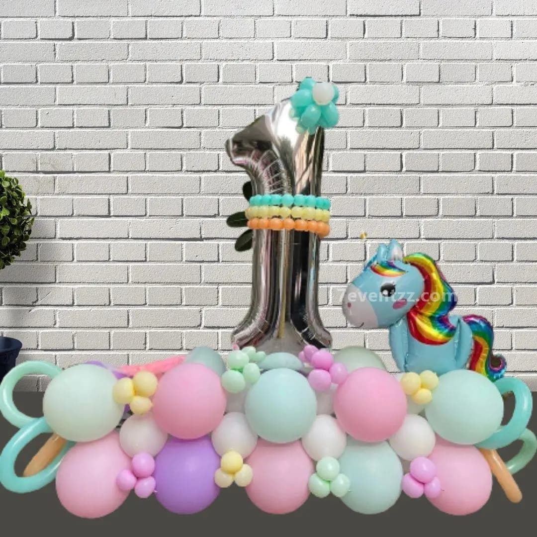 Unicorn birthday balloon bouquet with pastel foil and latex balloons in unicorn theme